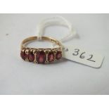 A 5 stone garnet ring in 9ct - size N - 2.8gms