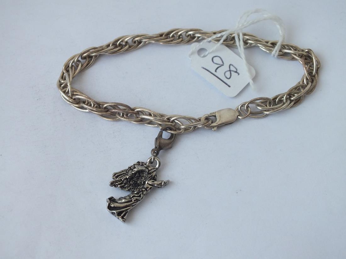 A silver bracelet with angel charm - 17.5gms