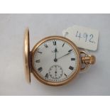 A rolled gold WALTHAM half hunter pocket watch