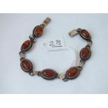 A silver & amber link 7 panel bracelet