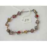 A silver glass cubed bead bracelet