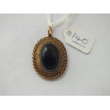 An antique gold banded agate oval hair locket pendant