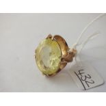 A large citrine dress ring in 9ct - size R - 9.6gms