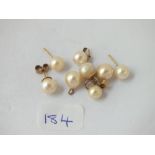 Three pairs of pearl earrings & matching pendant