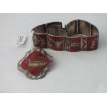 A sterling silver oriental panel bracelet & brooch