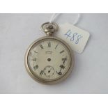 A metal cased gents pocket watch by INGERSOL with seconds sweep
