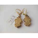 An attractive pair of gilt metal drop earrings