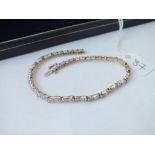 A link bracelet with diamonds in 9ct - boxed - 4.9gms