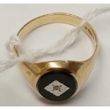 A black onyx & diamond ring in 9ct - size S - 3.7gms