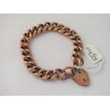 A CURB LINK BRACELET WITH HEART PADLOCK IN 9CT - 21.1gms