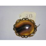 A large gold mounted antiques agate brooch