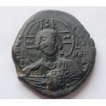 A Byzantine copper follis. Temp. Basil II (976-1025) Himbate bust of Christ, facing, holding book of