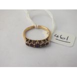 A 5 stone garnet ring in 18ct gold - size N - 3.2gms