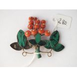 A unusual antique coral & malachite gold backed brooch - 16.7gms