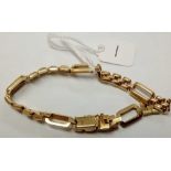 AN ATTRACTIVE FANCY LINK BRACELET IN 9CT - 14.2gms