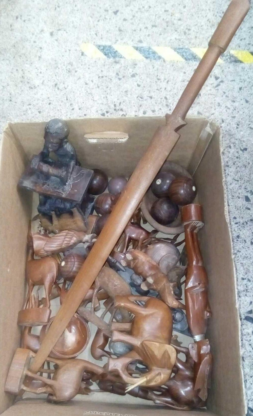 CARTON OF CARVED AFRICAN ANIMAL FIGURES & A STABBING SPEAR