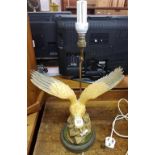 TABLE LAMP OF A GOLDEN EAGLE ON BRASS BASE