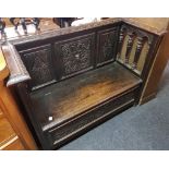 CARVED OAK MONKS BENCH WITH HINGED SEAT & STORAGE