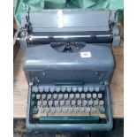 GREY IMPERIAL DESK TOP TYPEWRITER WITH PLASTIC COVER