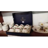 SHELF OF BOXED ROYAL WORCESTER COFFEE CUPS & SAUCERS, 18 RAMEKINS & A SMALL TRAY