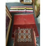 2 PATTERNED RUGS & A SADDLE BAG