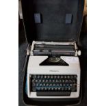 OLYMPIA PORTABLE MANUAL TYPEWRITER & CARRY CASE