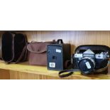 BROWNIE BOX CAMERA & PETRI FLEX REFLEX CAMERA WITH 55MM LENSE IN CASE & AN EMPTY BINOCULAR CASE