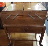 GOOD QUALITY 1930'S OAK SEWING CABINET WITH CONCERTINA TOP, CASTERS & CONTENTS