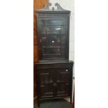 DARK MAHOGANY CORNER DISPLAY UNIT WITH CARVED FEATURES