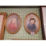 PAIR OF OIL PAINTINGS. PORTRAITS OF CHILDREN, BOTH SIGNED, OVALS