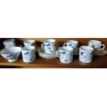 SHELF OF 8 COALPORT COFFEE CUPS & SAUCERS