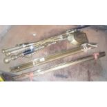 TWO BUNDLES OF BRASS STAIR RODS & A BUNDLE OF BRASS FIRESIDE IRONS
