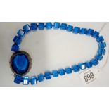 UNUSUAL BLUE GLASS CUBE SHAPED NECKLACE WITH CENTRAL SILVER BOUND STONE