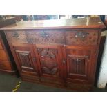 OAK 3 DRAWER CARVED SIDE CABINET WITH CUPBOARDS BELOW