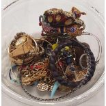 A TUB OF DRESS JEWELLERY