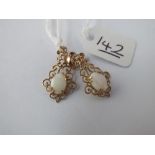 A pair opal drop earrings in 9ct
