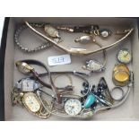 A carton of assorted watches