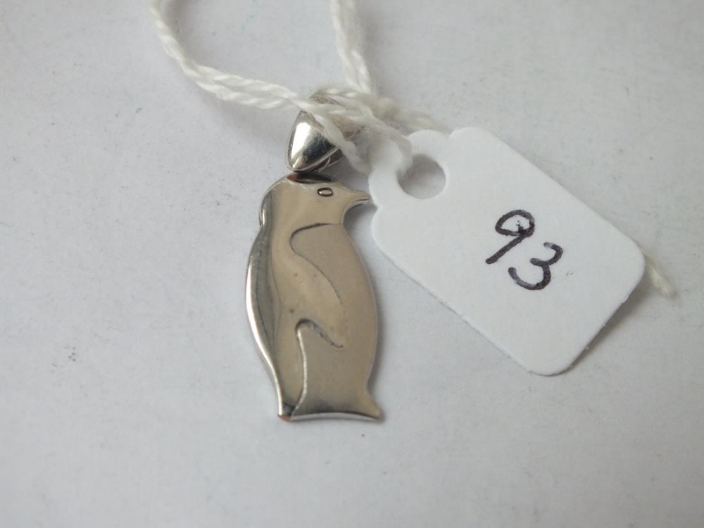 An unusual white gold pendant in 9ct in the form of a penguin