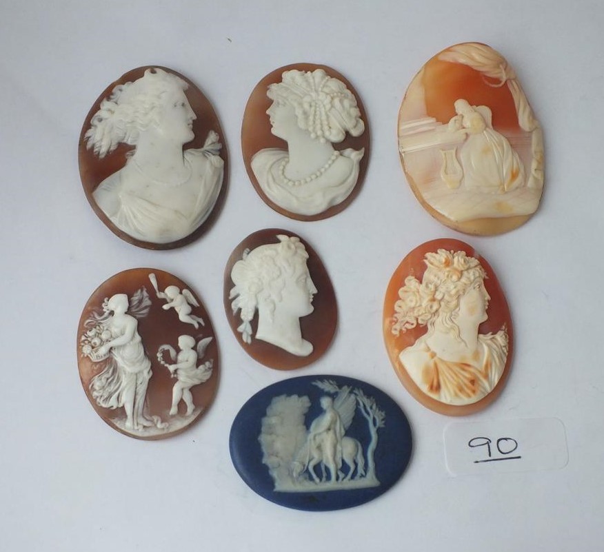 A collection of 6 antique unmarked carved shell cameos & 1 Wedgwood plaque