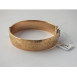 A rolled gold bangle