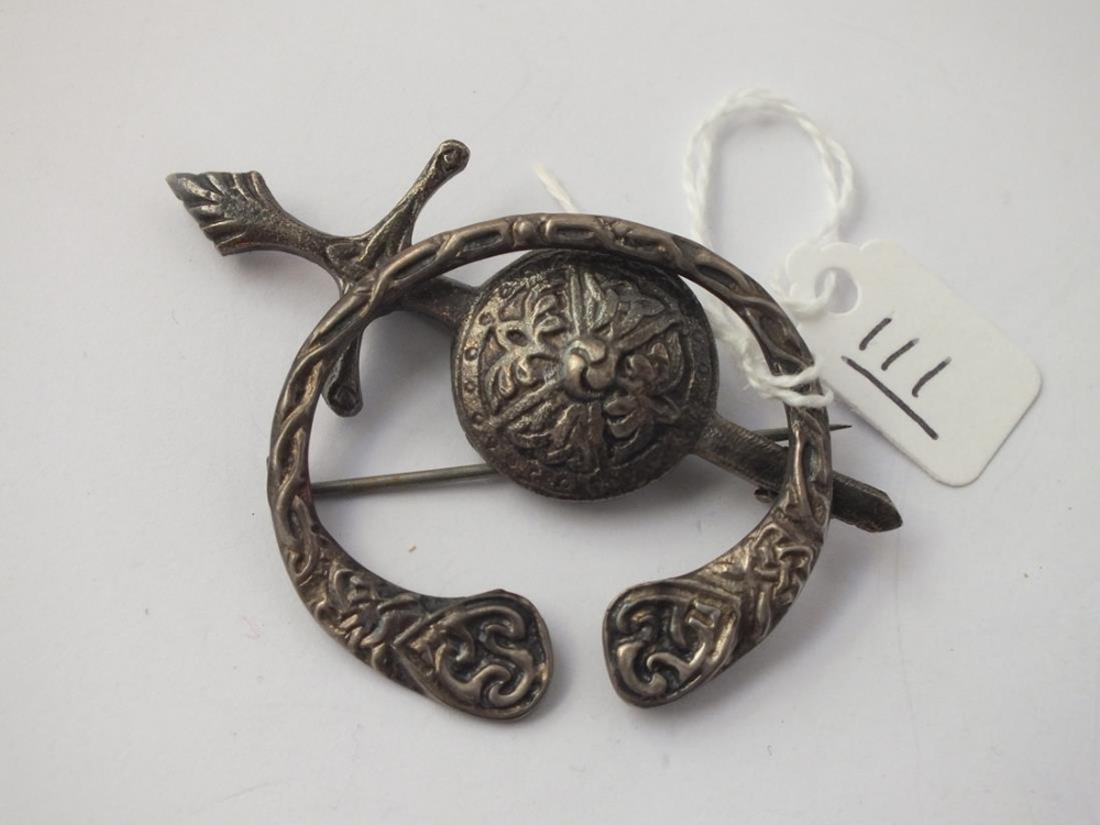 Two Celtic style silver brooches