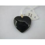 A hard stone heart shaped pendant with 9ct marked bale