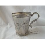 Another South American mug chased with flower heads. Scroll handle - 4" high - 223gms