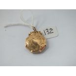 An antique octagonal gold back & front locket with engrave decoration in 9ct - 4.4gms