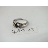 A platinum 3 stone diamond ring (1 stone missing & shank broken)