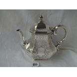 An early Victorian teapot with baluster-shaped body engraved with scrolls - London 1844 by E,E J&W