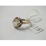 A yellow stone dress ring in 9ct - size P - 2.4gms