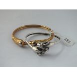 A silver rams head tort bracelet & a gilt eagles head tort bracelet