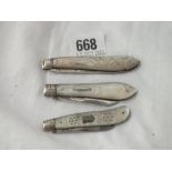 Three silver mounted and MOP fruit knives