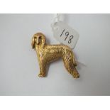 A brooch in the form of a Afghan hound in 9ct - 9.6gms
